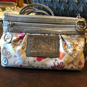Coach wristlet (smaller purse) with shoulder strap